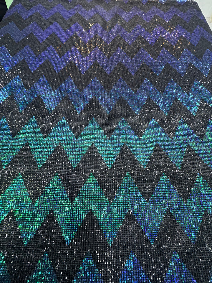 Blue-Green Iridescent Chevron Sequin Fabric on Black Mesh