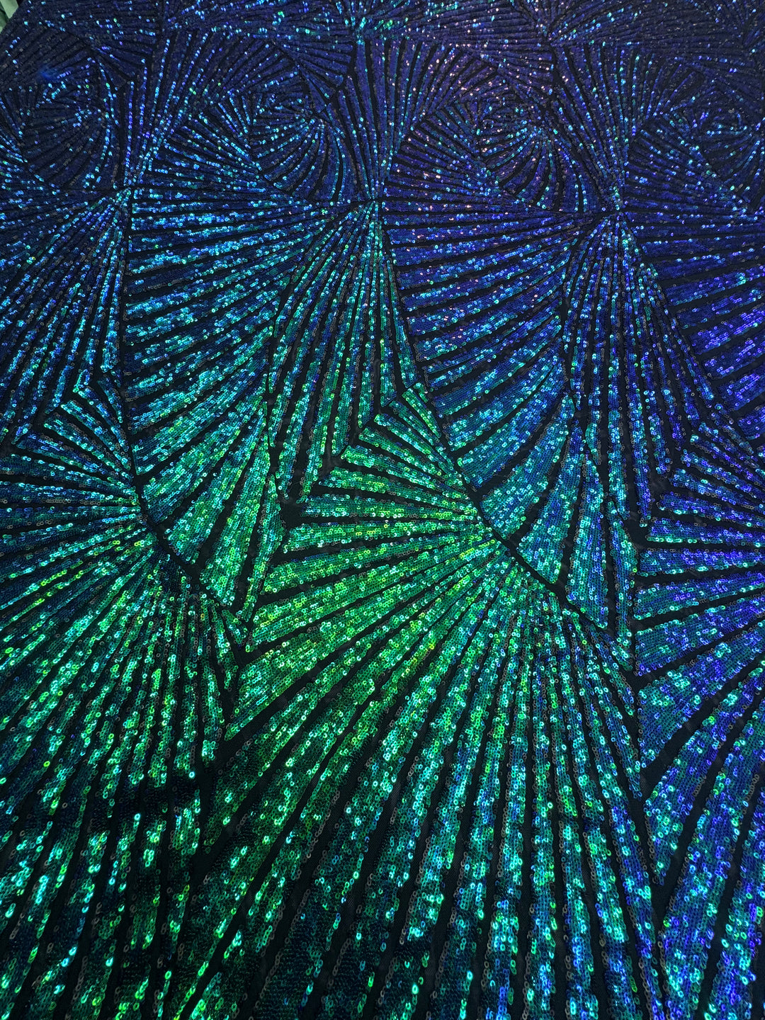 Blue-Green Iridescent Sequin Fabric on Black Mesh ( 1 Piece = 4 Meter)