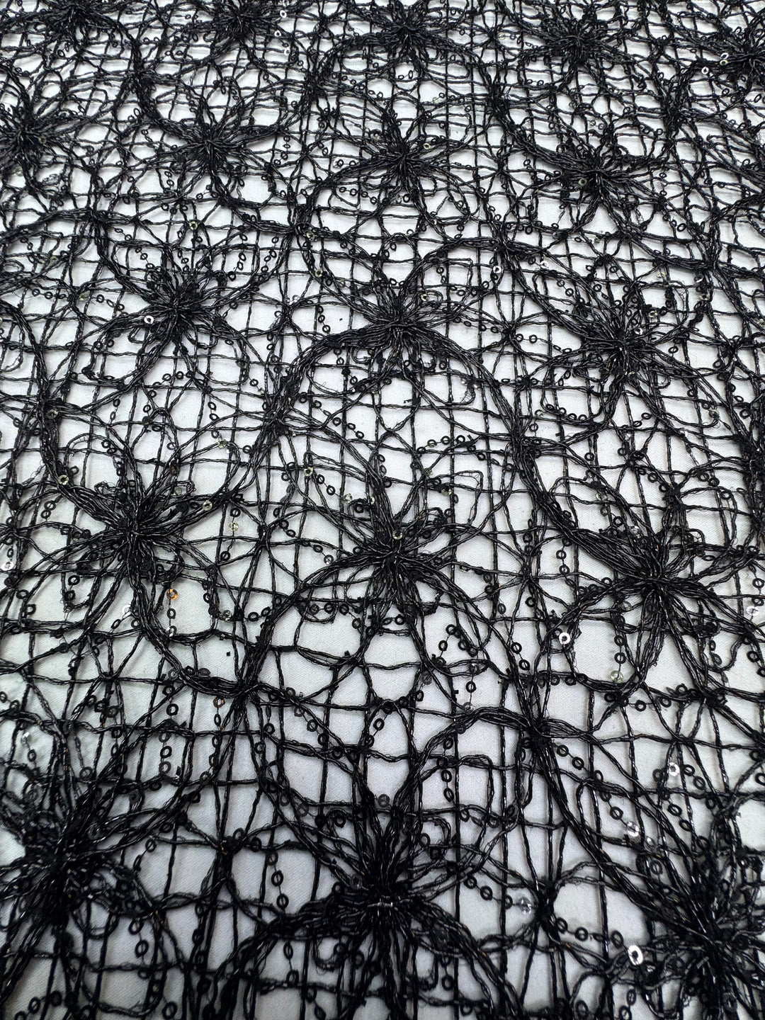 00Midnight Petal Net – Black Corded Lace with Sequins and Floral Motif